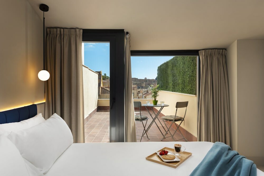 Фото Coeo Peña Design Apartments