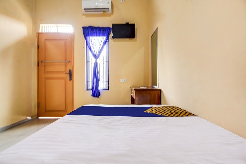 Фото Spot On 90433 Serasi Kost