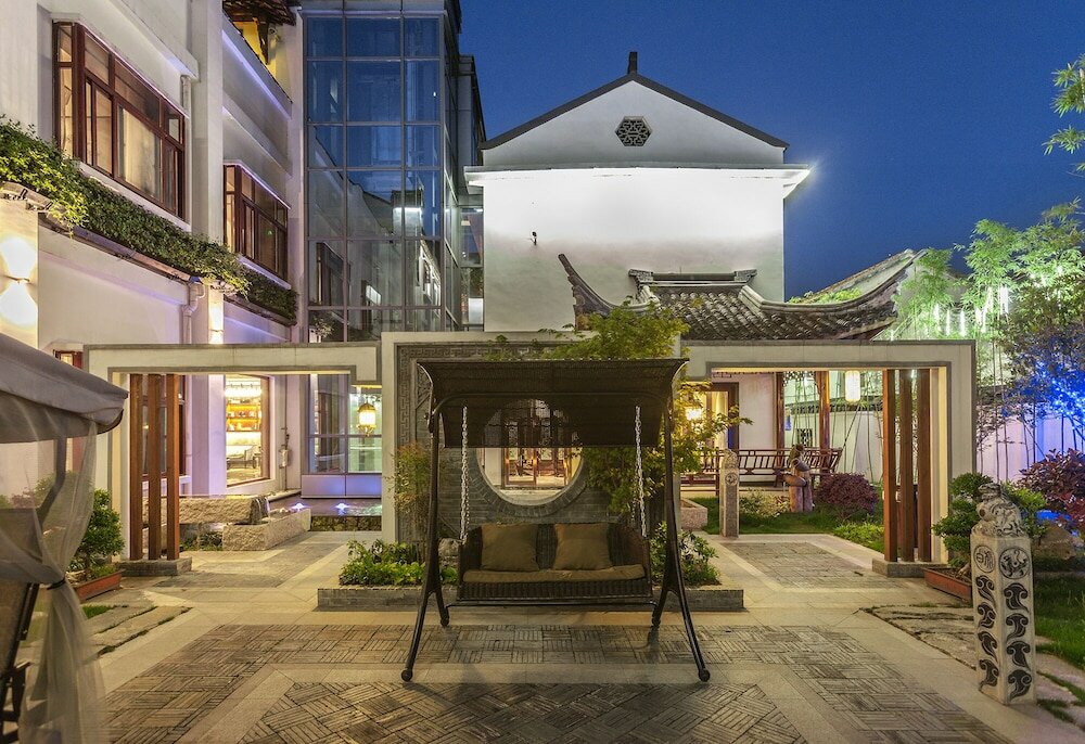 Фото Hejing Chengshang Generations Hotel