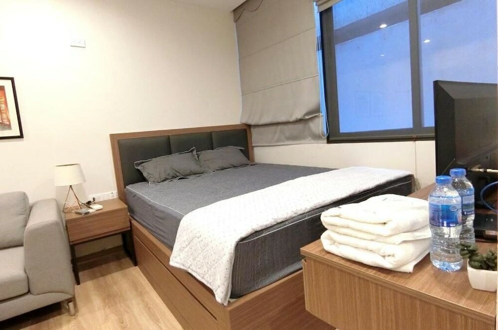 Фото Lotus Inn Serviced Apartment