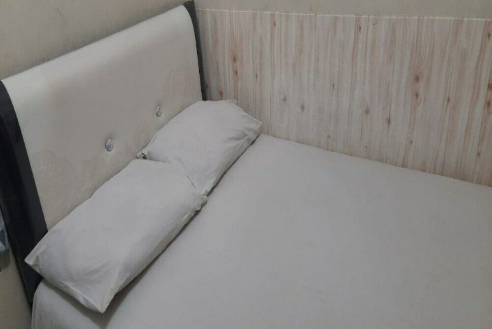 Фото Oyo 90706 Kost Alam Jaya Syariah