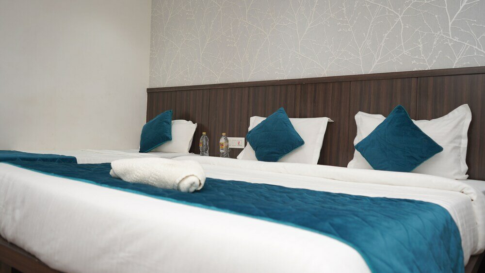 Фото Qotel Hotel Rajori Garden