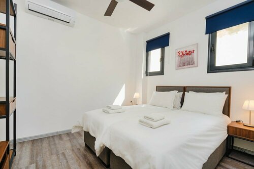 Гостиница Sanders Home Suites - Cozy Downtown 1-bdr Apt в Афинах