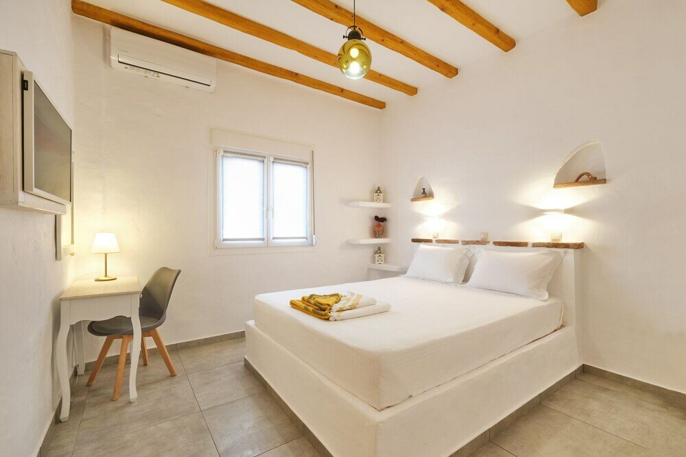 Фото Eressian Lodgings Apartments