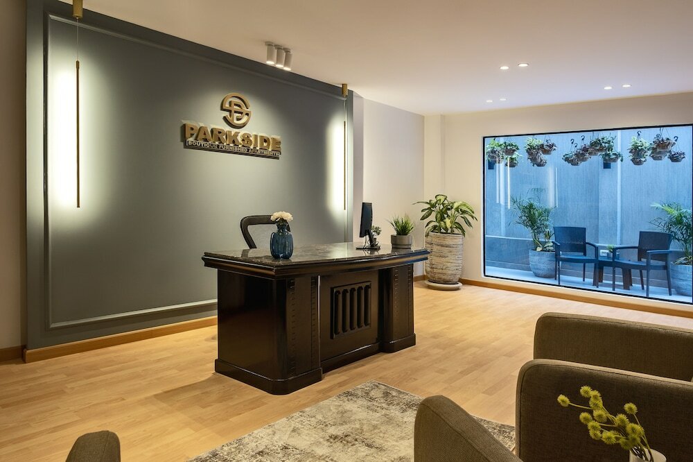 Фото Parkside Boutique Furnished Apartments