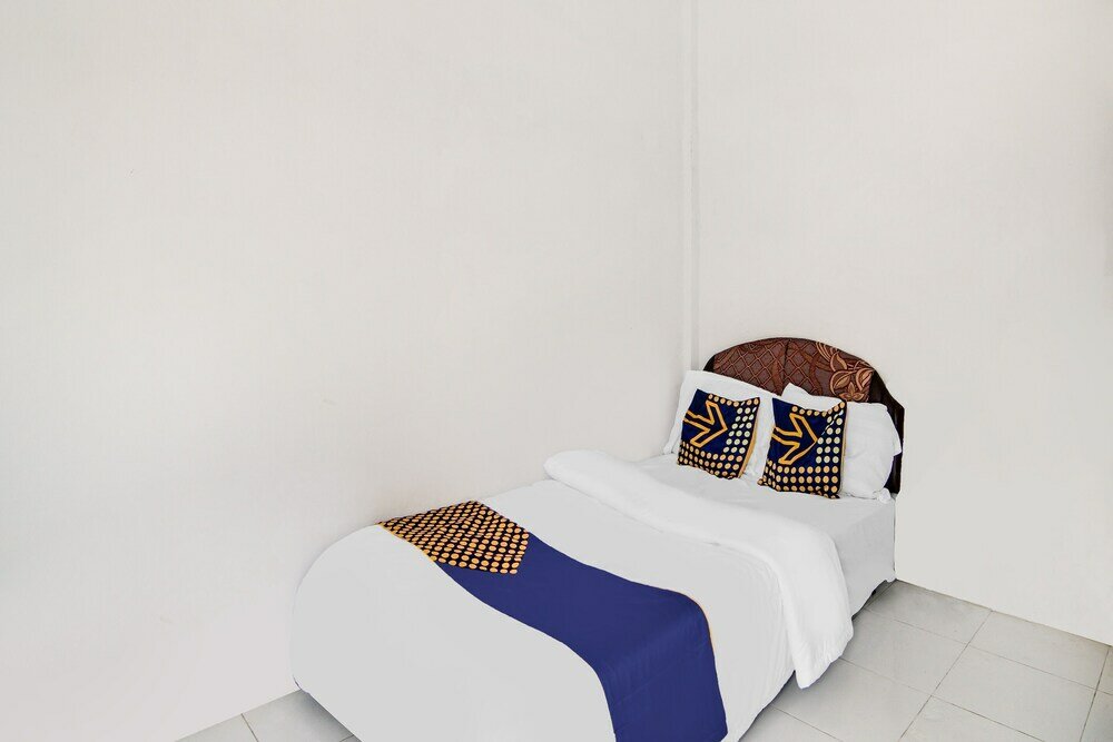 Фото Spot On 91858 Raja Homestay Syariah