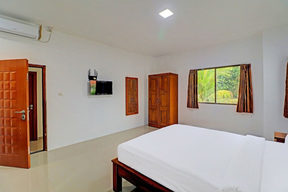 Фото Capital O 92039 Runways House