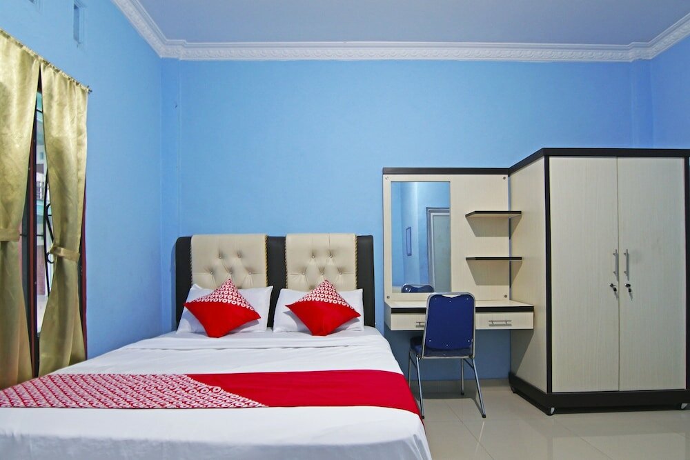 Фото Oyo 90752 Ridho Guest House Syariah