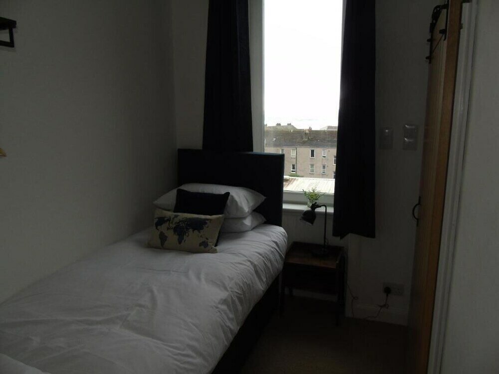 Фото Snug - Sealladh Mara Apartment