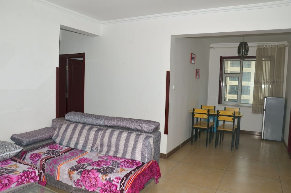 Фото Lanzhou Longshang Mingzhu Apartment Two-bedroom suite