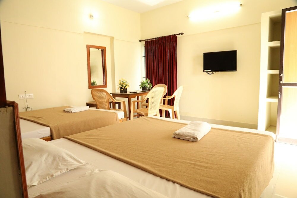 Фото Hotel Amutham Residency