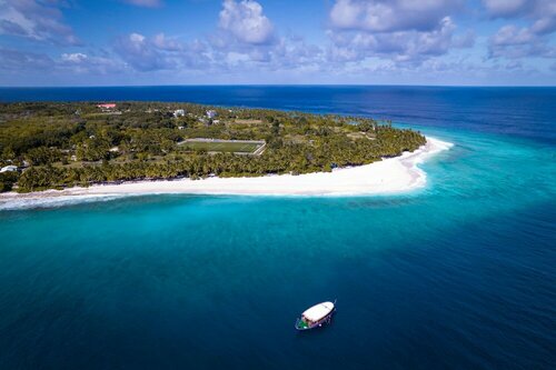 Гостиница Отель Equator Inn на Атолле Гнавийани