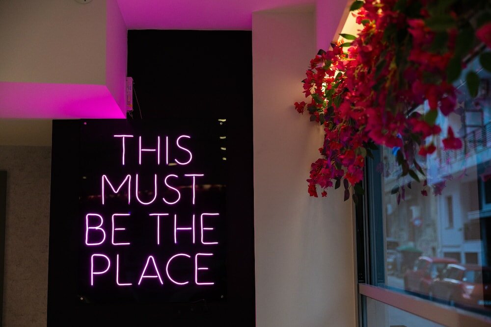 Фото The Q Hotel