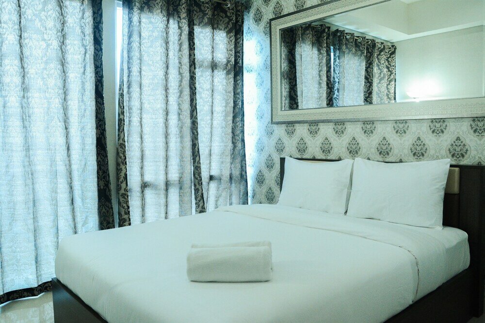 Фото Modern City View Studio Apartment at Puri Mansion