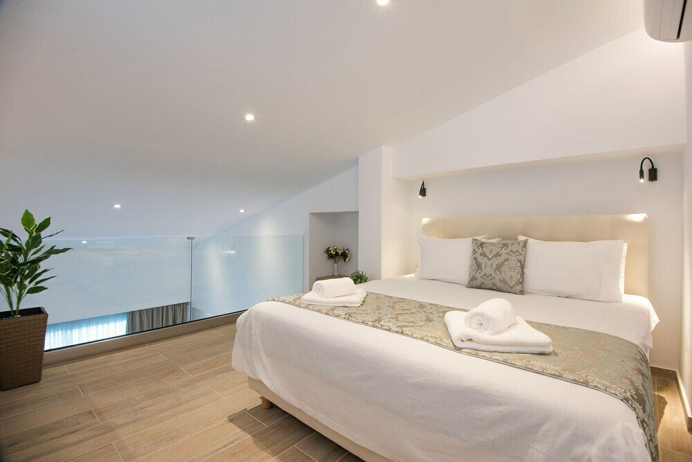 Фото Ammos Luxury Suites