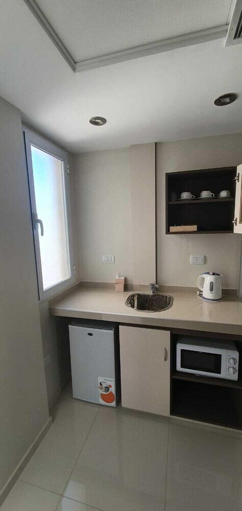 Фото Edificio Brown Departamentos Temporarios