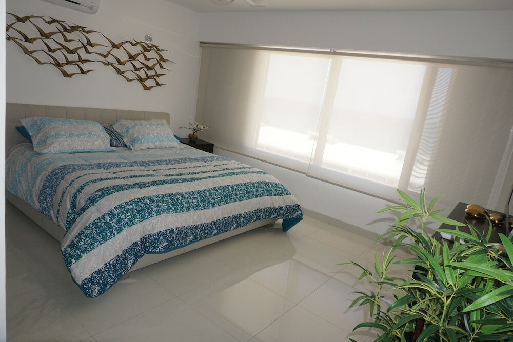 Фото Beachfront Penthouses at Brisas by The Spot