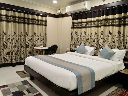 Гостиница Jade Blue Suites в Бангалоре