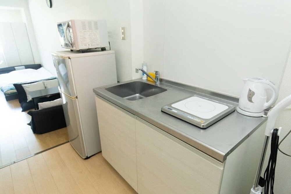 Фото Guesthouse Daikokucho Ekimae