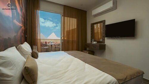 Гостиница Celia Pyramids View inn