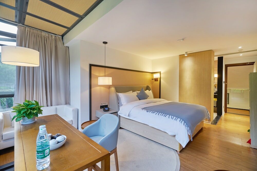 Фото Wuhua Xingxiang Shanfang Hotel