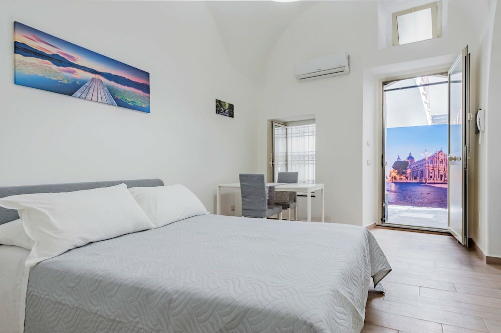 Фото Trinità 57 Apartments