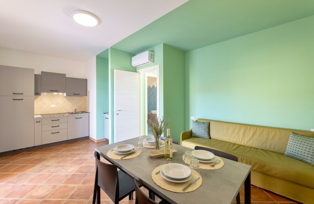 Фото Residence with pool in Isola Rossa