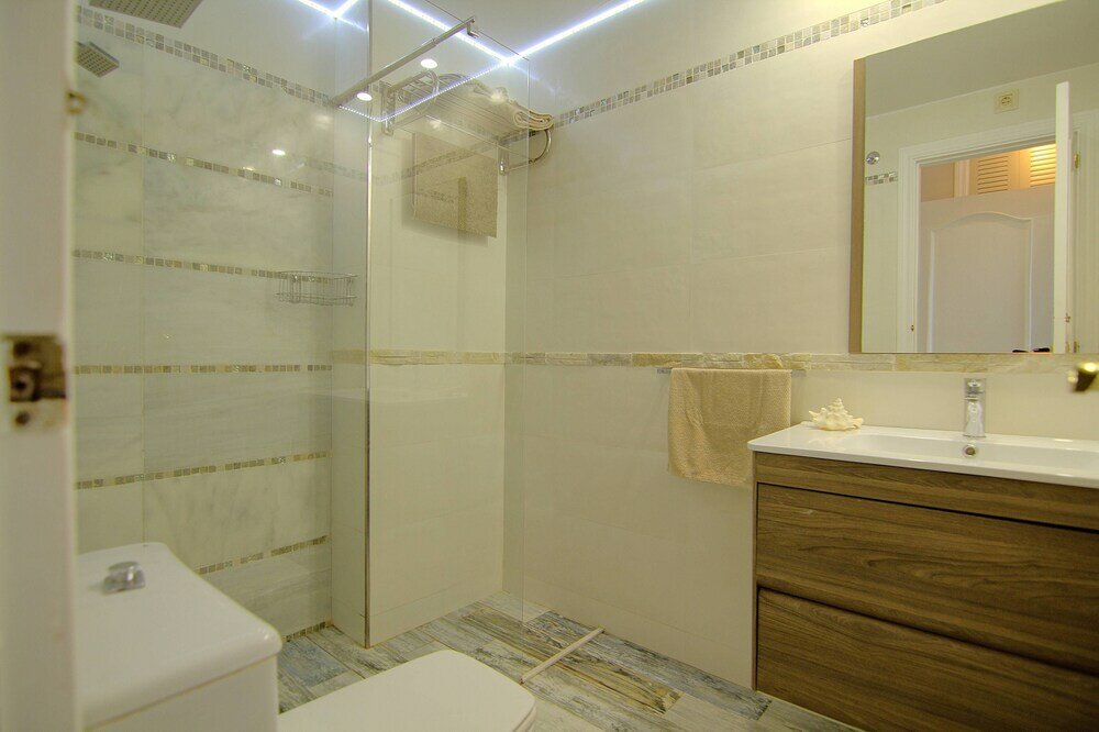 Фото Oasis de Riviera Apartment