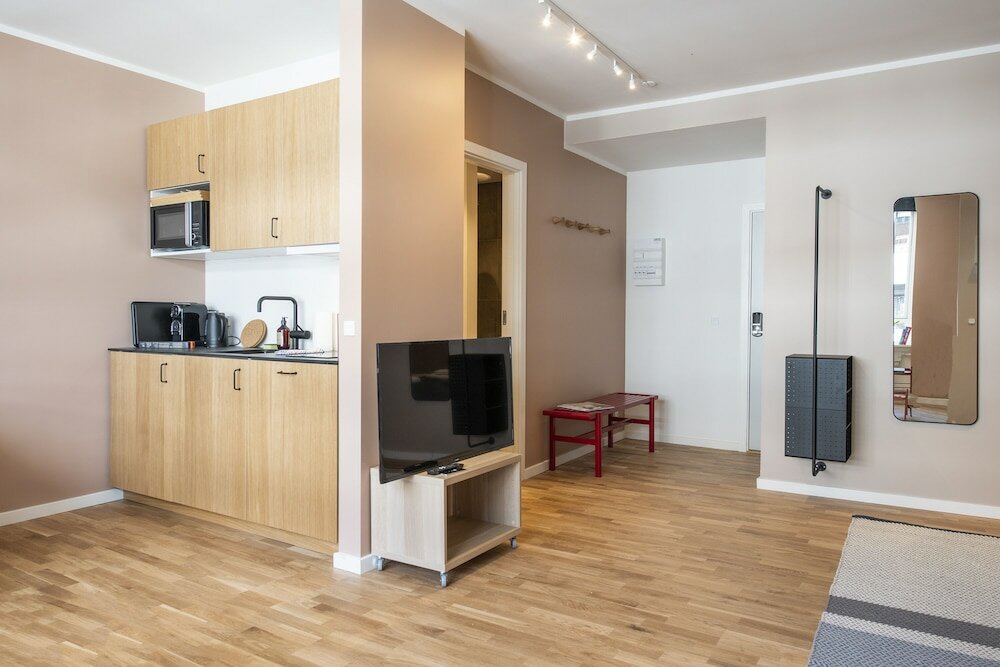 Фото By the Lakes apartments - Into This Place