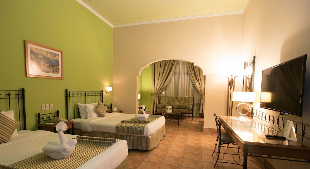 Фото Mena Holiday Beach Resort Half Moon Bay