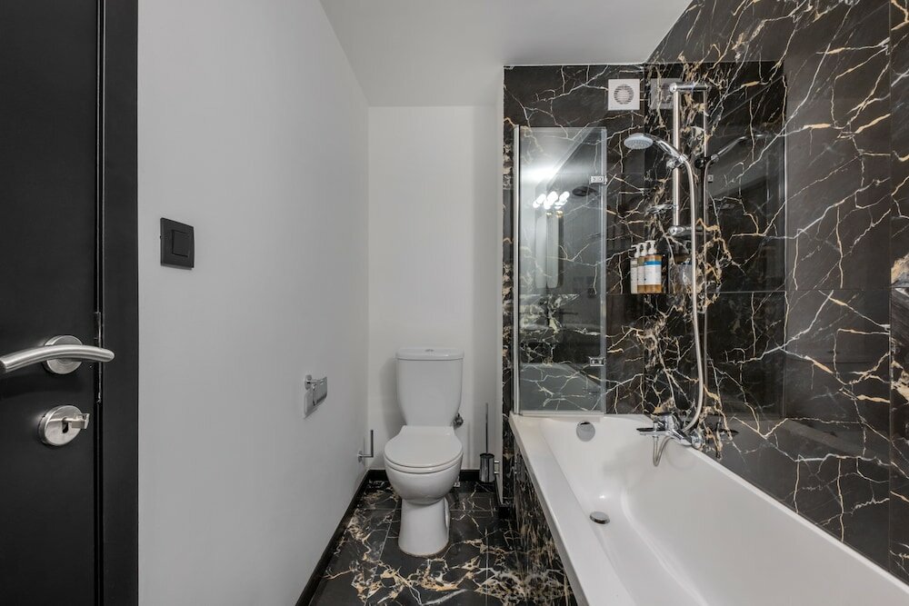 Фото Numa i Scoop Rooms & Apartments