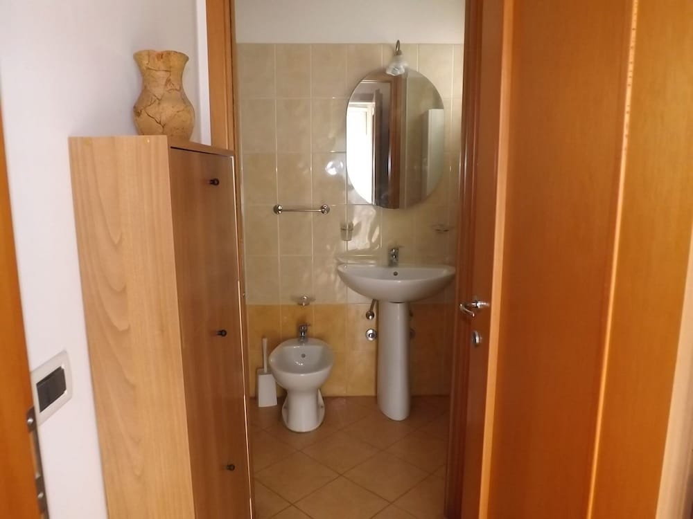 Фото Appartamento sulla spiaggia con balcone