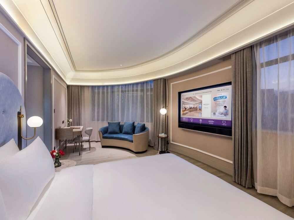 Фото Mercure Qingdao Downtown