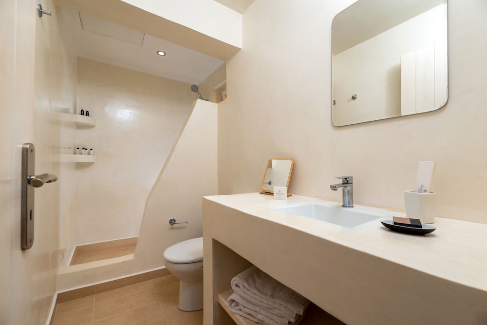 Фото Thallos Cave House and Apartments