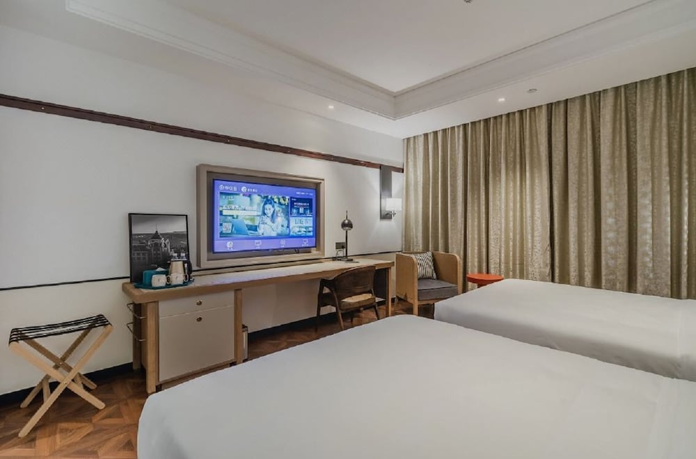 Фото Manxin Hotel Qingdao Zhanqiao