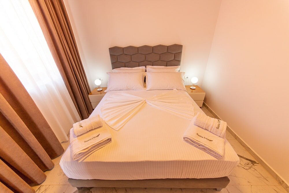 Фото Santa Oliva Suites