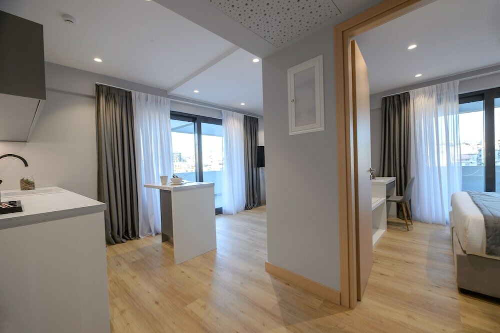 Фото The Convo Syngrou Apartments