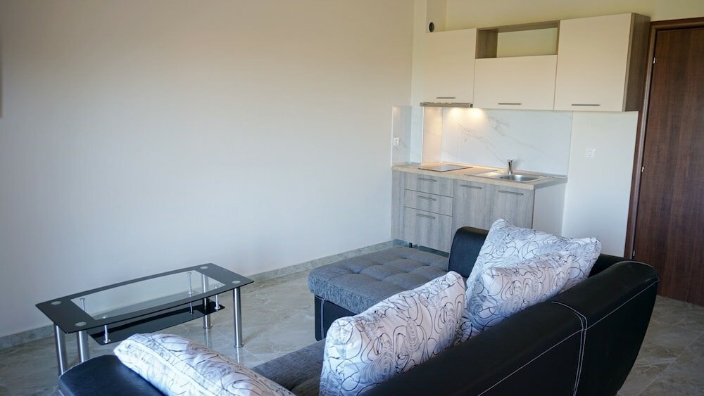 Фото Sinodinos Deluxe Apartments