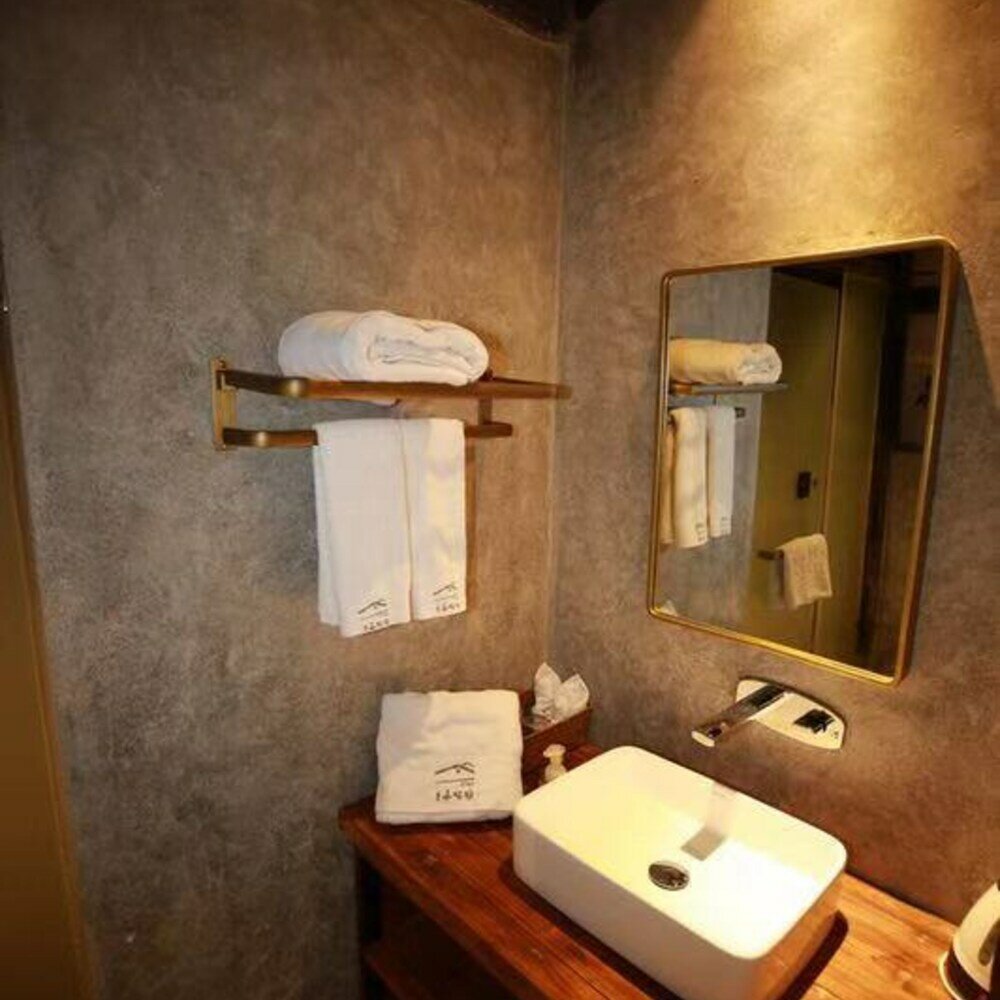 Фото Xiaochaguniang minsu