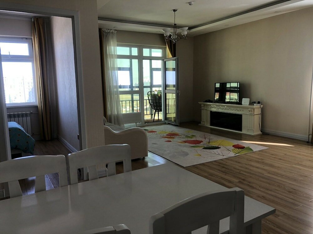 Фото Eagle Town Service Apartment