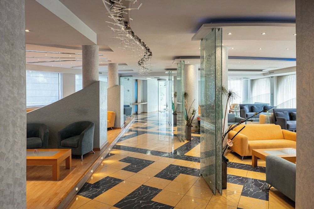 Фото Kreoli Suites Glyfada