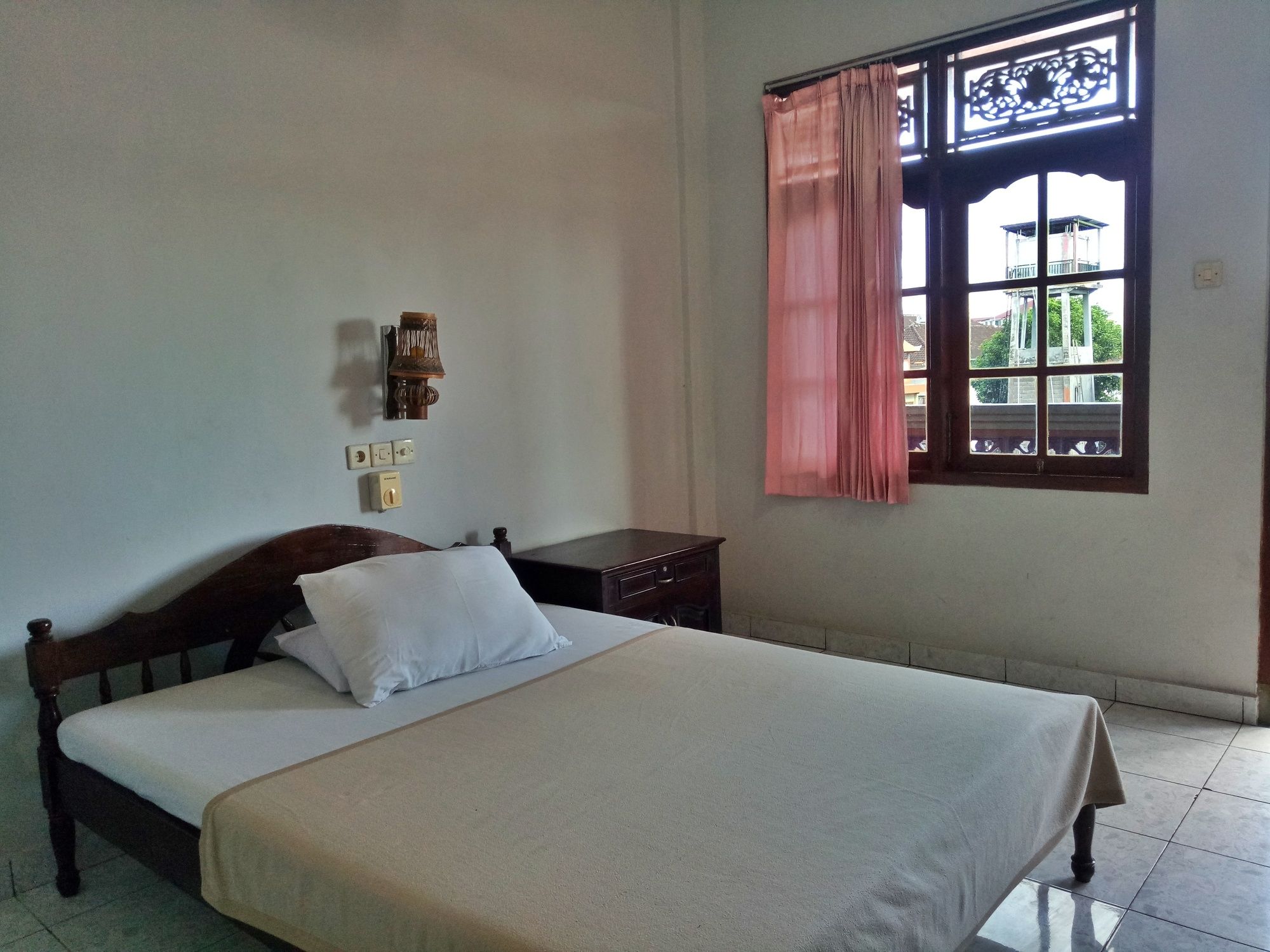 Фото Taman Mekar Beach Inn 2