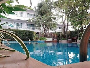 Фото Baan Suksiri Hotel