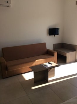 Фото Cosmelenia Hotel Apartments