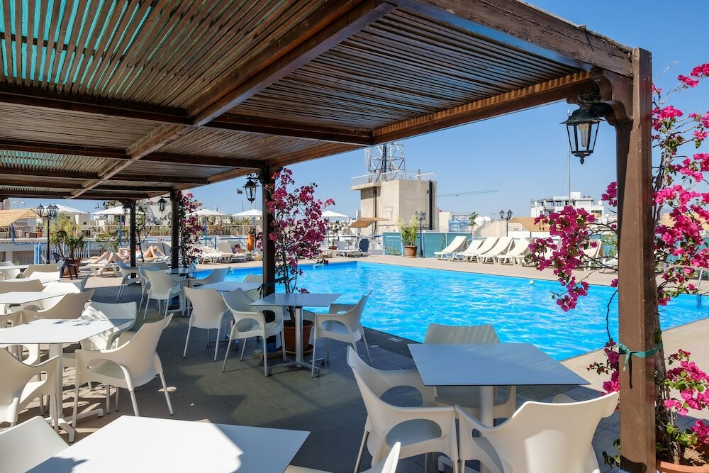 Фото Atrium Zenon Hotel Apartments