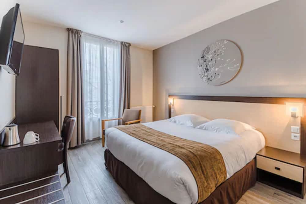 Фото Grand Hotel Clichy Paris