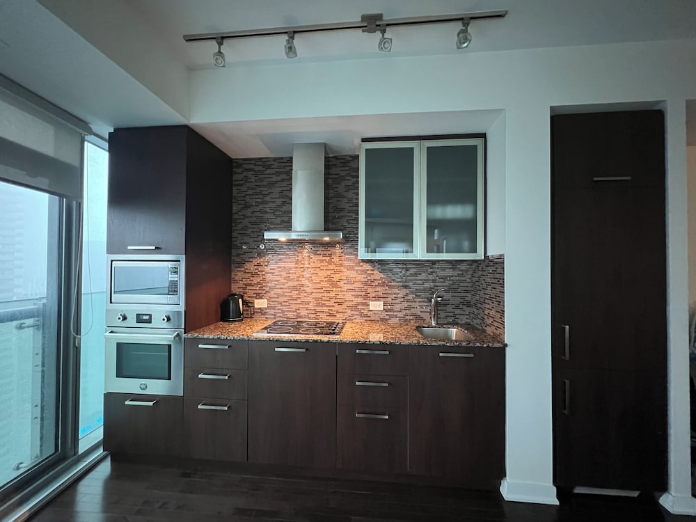 Фото Elite Urban Lodgings