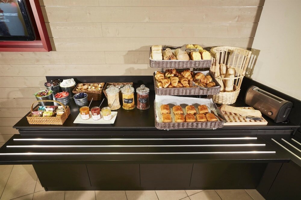 Фото Campanile Lyon Centre Berges du Rhône