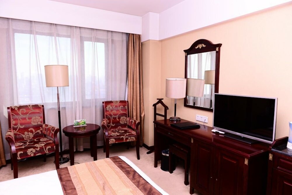 Фото Harbin Kunlun Hotel (Railway Station Museum)