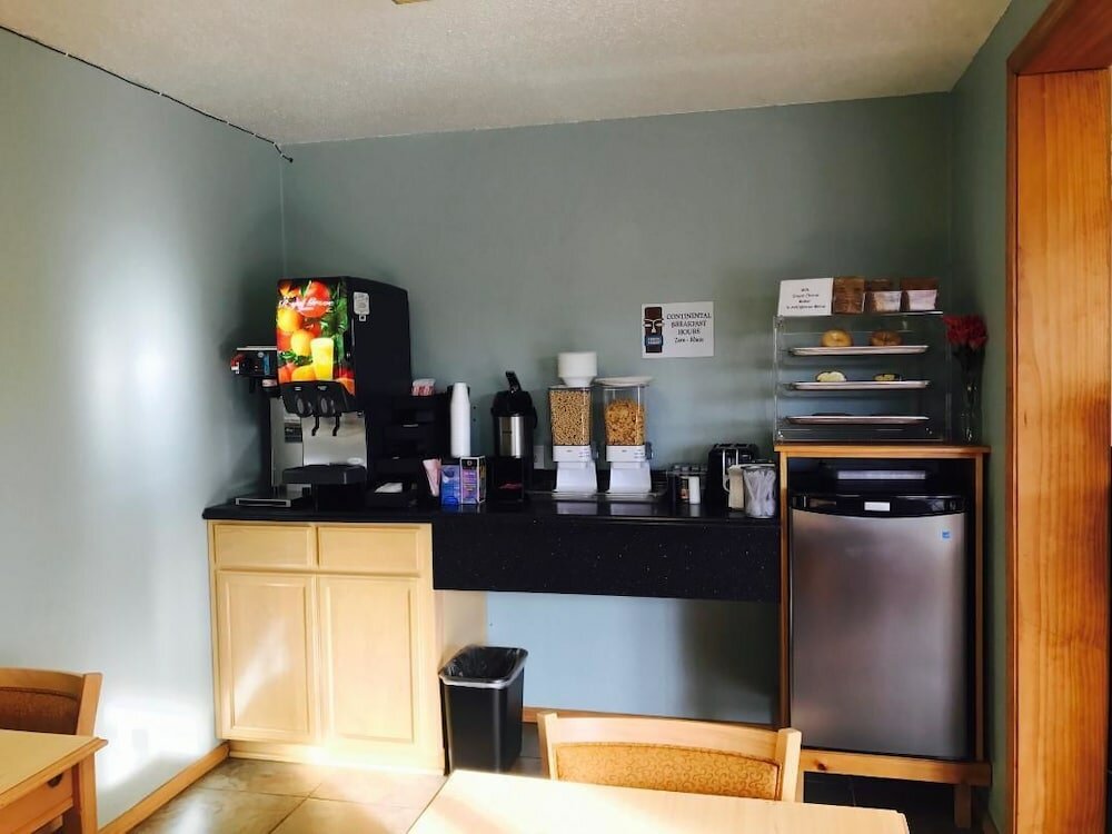 Фото Tiki Lodge Motel